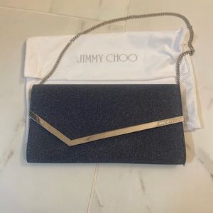 Jimmy Choo Emmie clutch bag. In denim glitter.